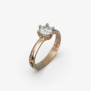 Forlovelsesring i 18 kt rosaguld med naturlig diamant 0,50 ct., set fra siden