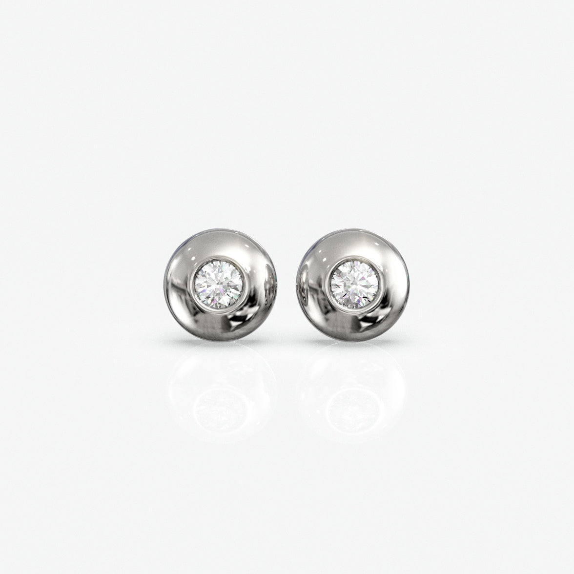 Diamantørestikker i 18 kt hvidguld, 0,06 ct. pr. par, produktfoto