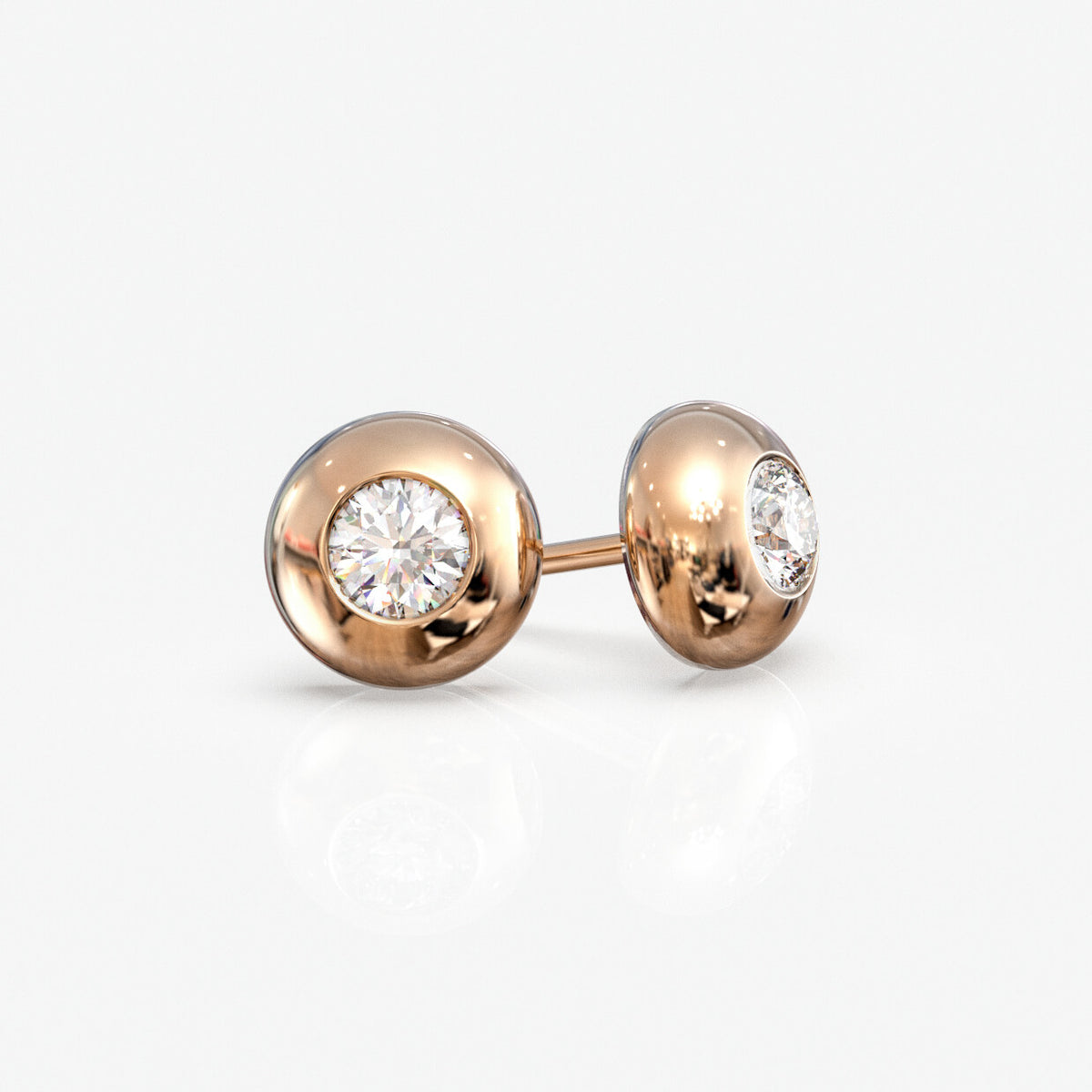 Diamantørestikker i 18 kt rosaguld, 0,20 ct. pr. par, set fra siden