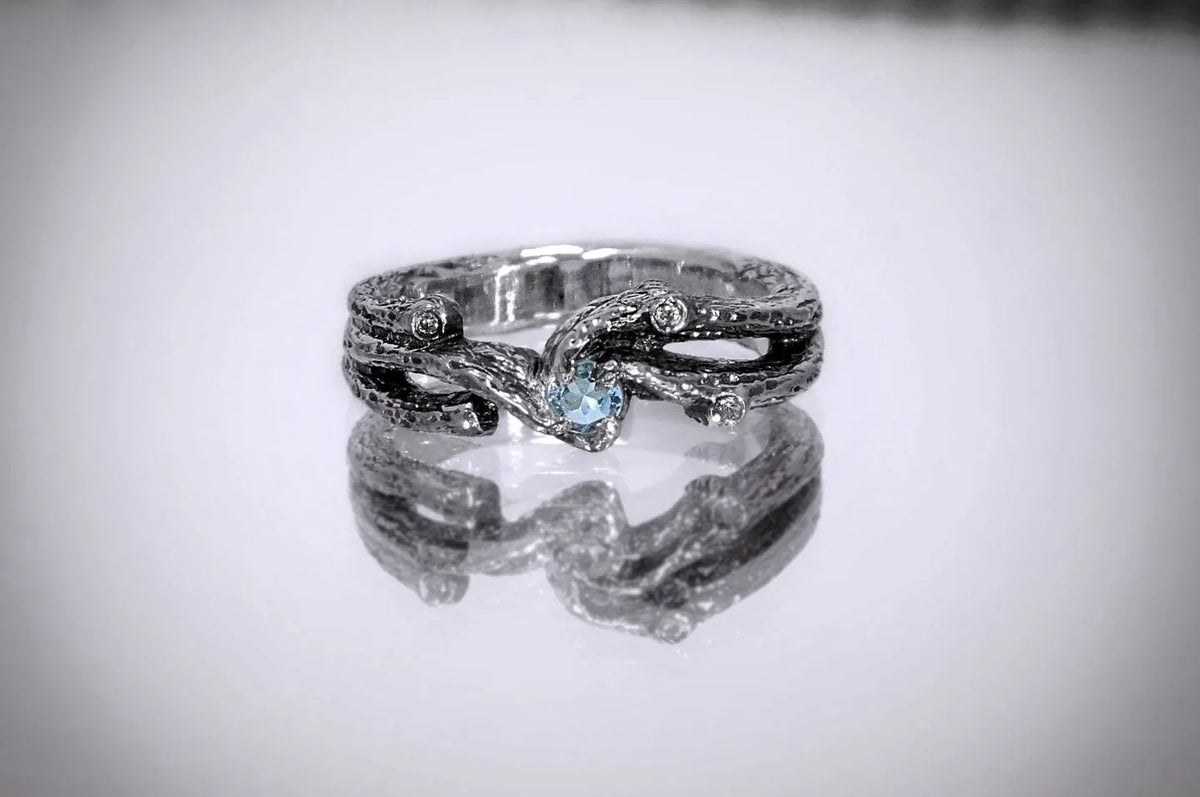 Ring med to snoede former — en anden vinkel