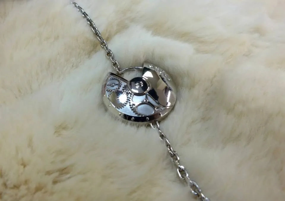 Armbånd med rund lys detalje