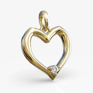 Hjertevedhæng i 18 kt gult guld med naturlig diamant, set forfra