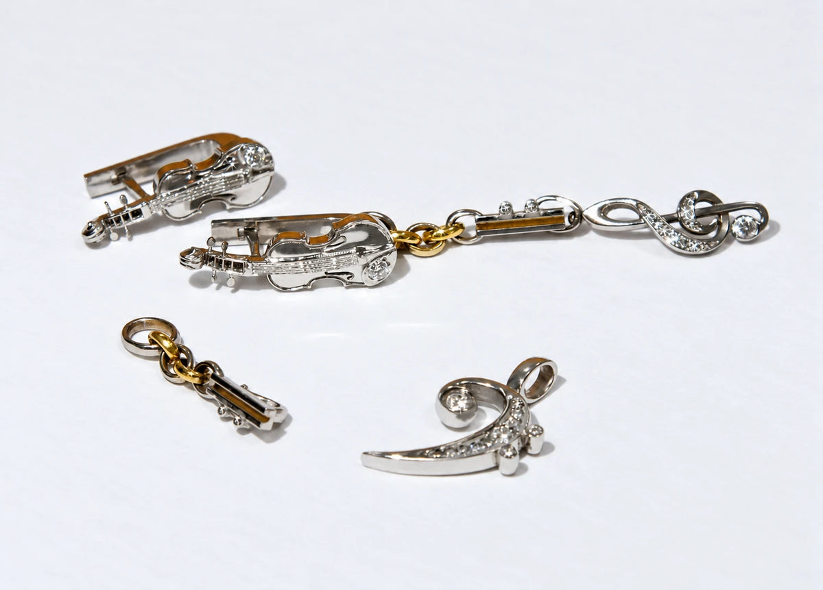 Violinøreringe med aftagelige musikmotiver og forskellig længde